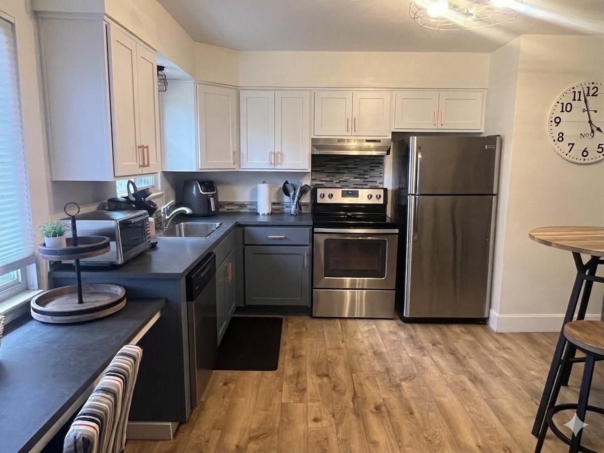 Denver kitchen after cabinet refacing with white Shaker doors